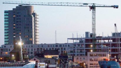 Industrial building on a harbour with a crane
