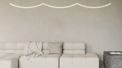 Scalloped light above sofa