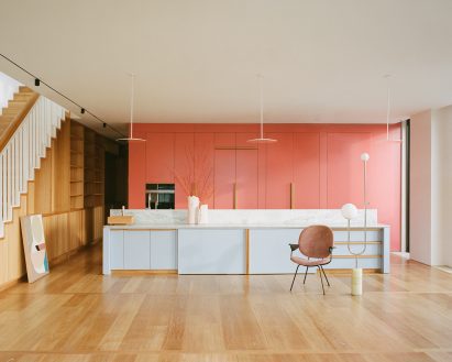 Salmon pink kitchen in Melbourne apartment by Office Alex Nicholls