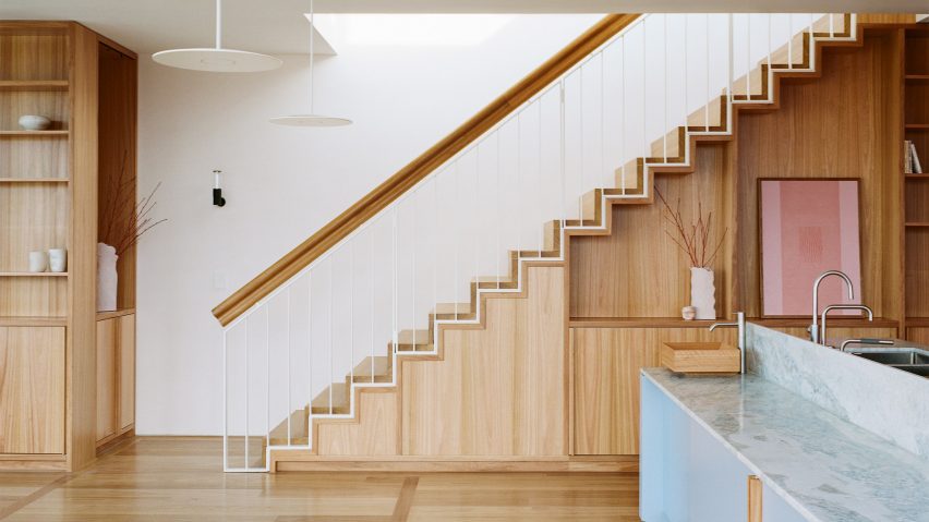 Wooden staircase inside Elsternwick Penthouse in Melbourne by Office Alex Nicholls