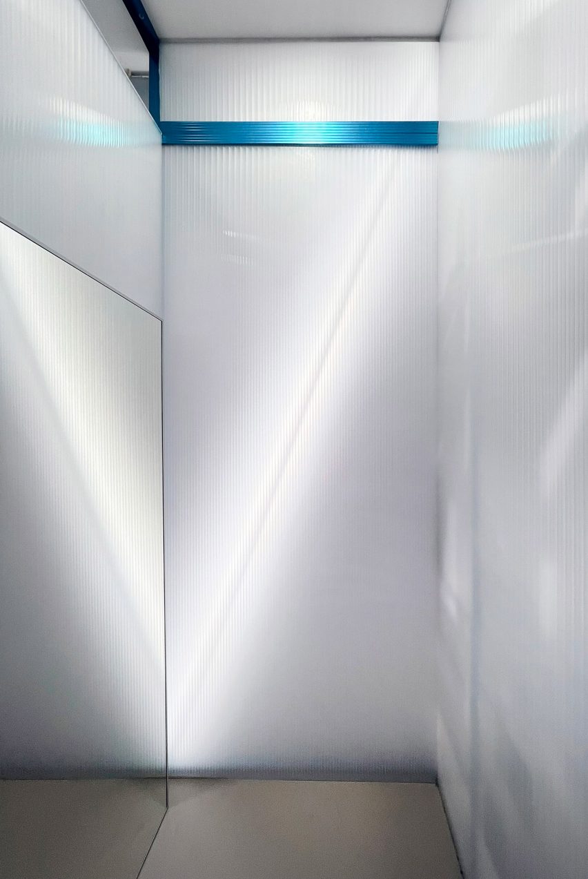 ON-OFF store in Milan features gridded blue interior by Francesca Perani and Bloomscape