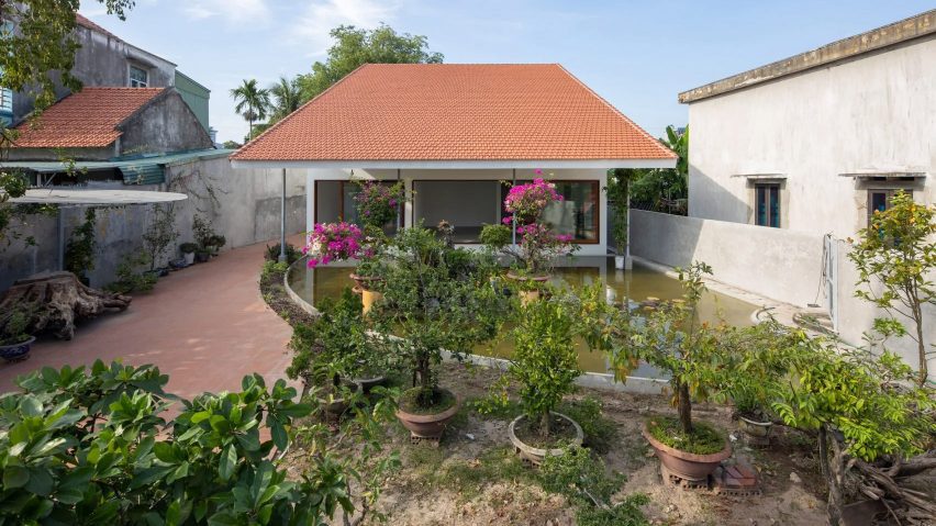 Vietnamese home with oversized roof