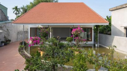 Vietnamese home with oversized roof