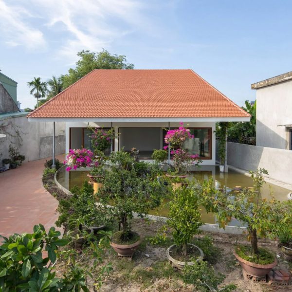 Vietnamese home with oversized roof
