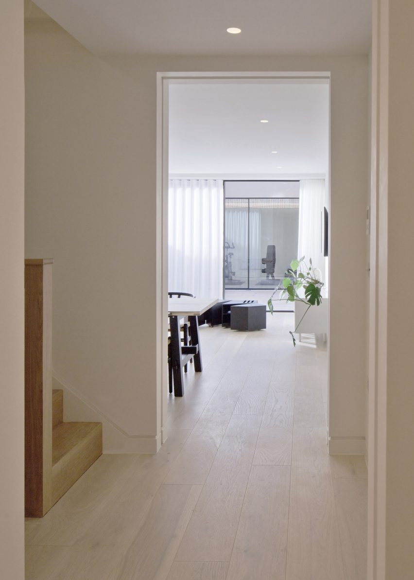 Kitchen and living spaces are sunken below street level