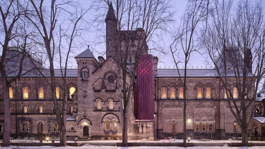 Contemporary elevator added to gothic-style building