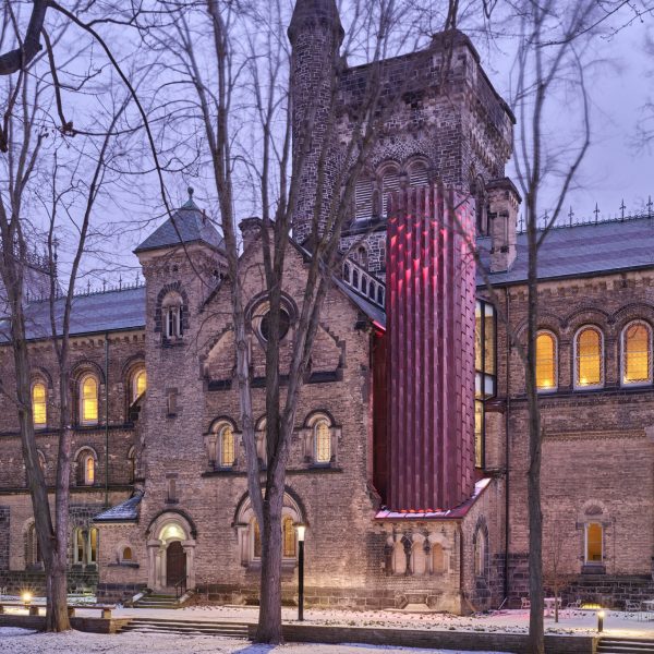 Contemporary elevator added to gothic-style building