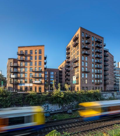 Rectilinear brick-clad CLT building on a corner site in Dalston