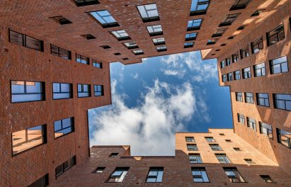 Perspective of the sky above the brick-clad Dalston Works building
