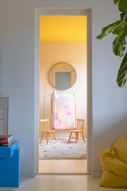 Play area with long narrow open door frame within Stockholm apartment
