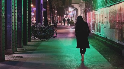 Woman walking at night