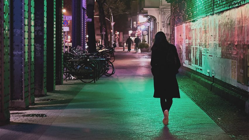 Woman walking at night