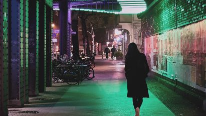 Woman walking at night