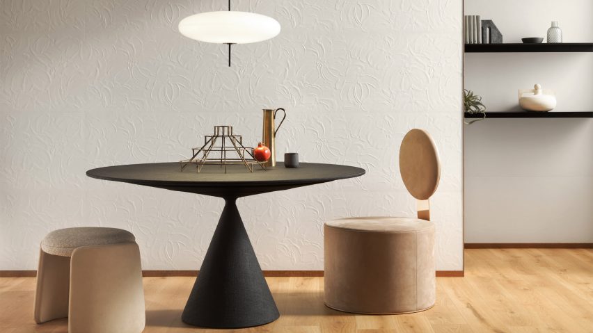 Photo of a plaster wall surface behind a dining table and chairs