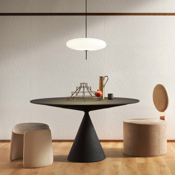 Photo of a plaster wall surface behind a dining table and chairs