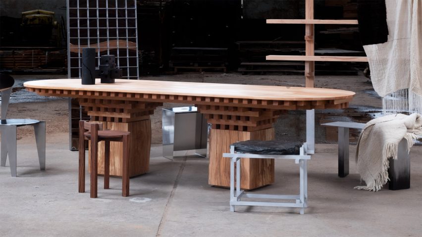Photo of a wooden table with metal and wooden chairs