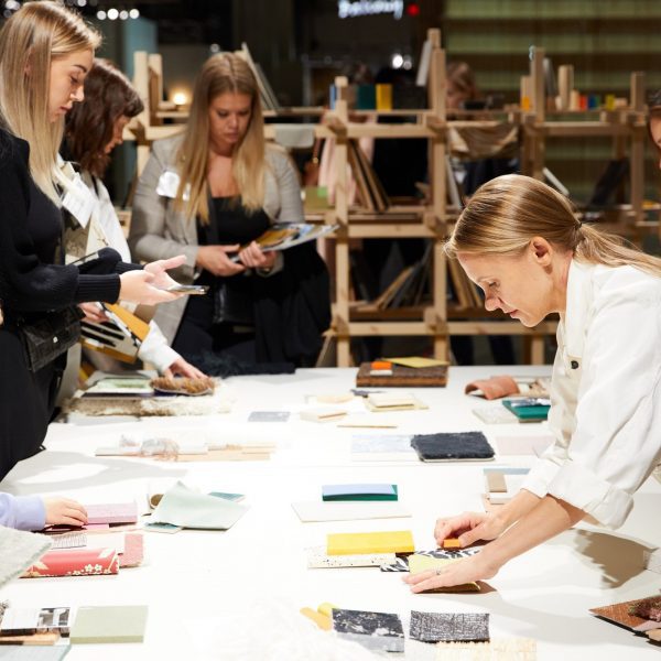 Photo of people looking at fabrics