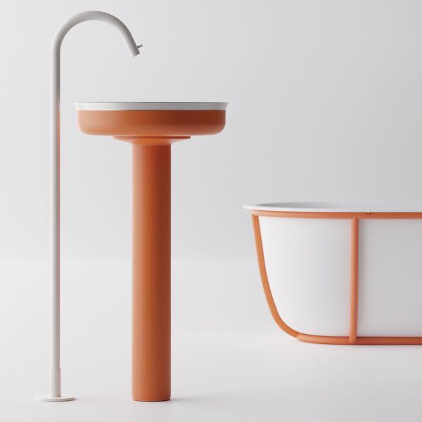 Photo of an orange washbasin and bath