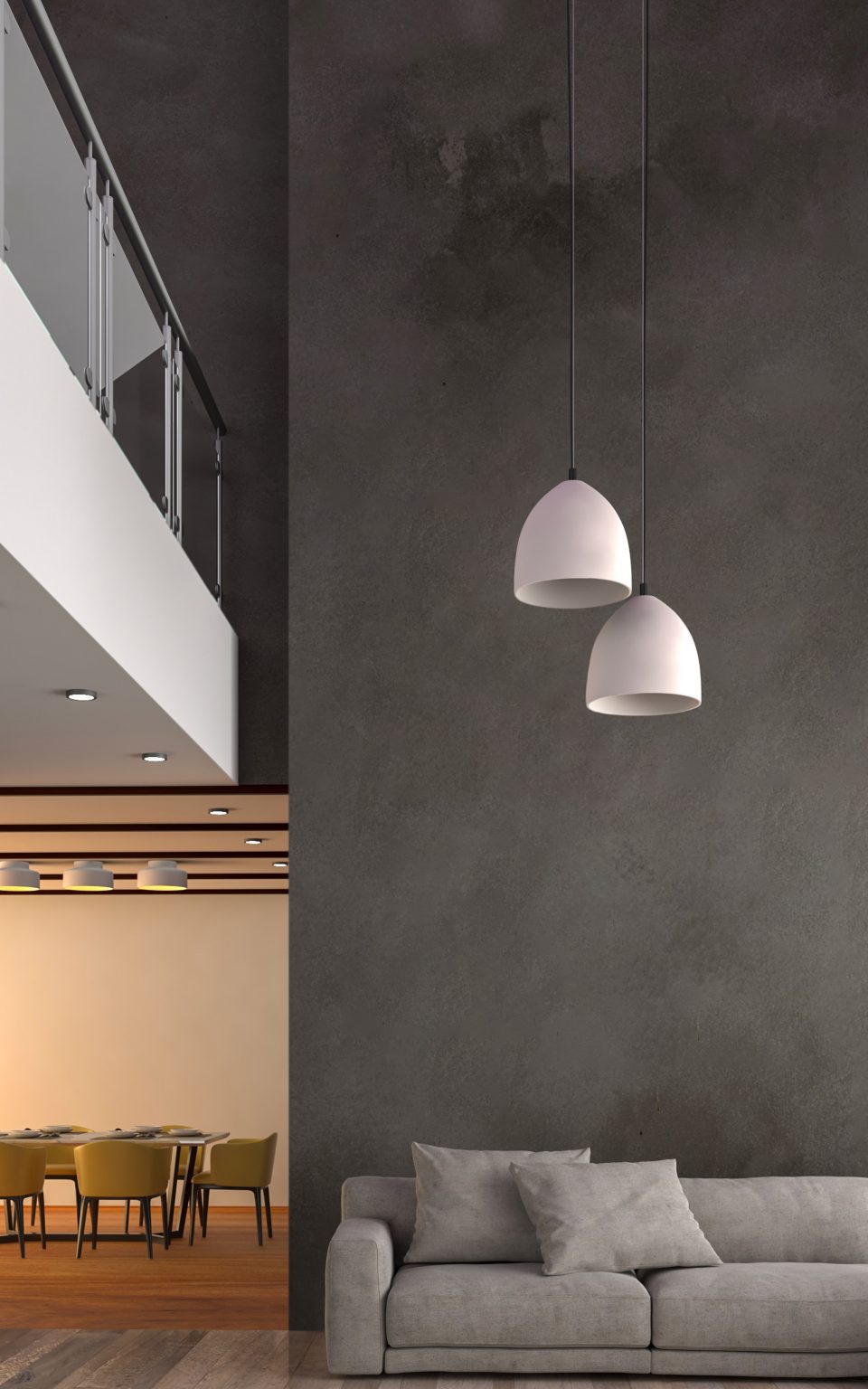 Photo of two pendant lights above a grey sofa