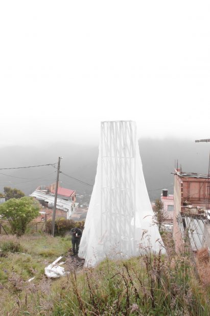 White fabric water harvester with foggy colombia background