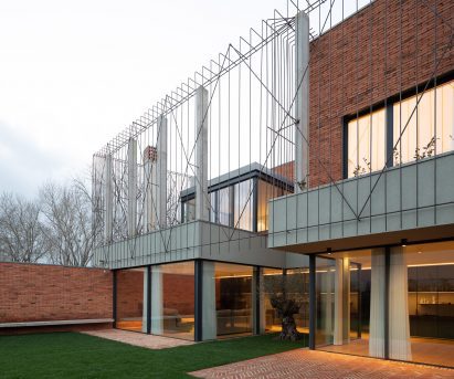 Porto house wrapped in screen of iron bars
