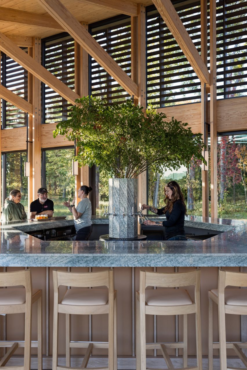Green marble bar in a glulam structure building
