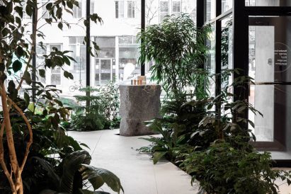 Granite plinth surrounded by plants