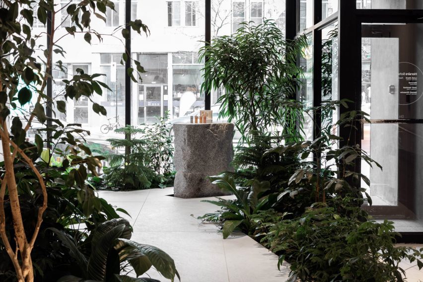 Granite plinth surrounded by plants
