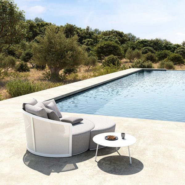 Outdoor seating on poolside terrace