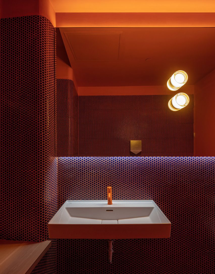 Orange public bathroom