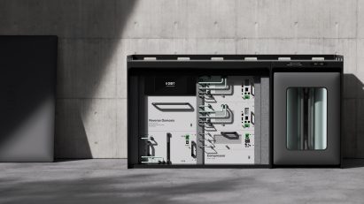 Rendering of the Nanoplant with front surface removed, showing interior machinery connected with tubes and displaying switches and buttons