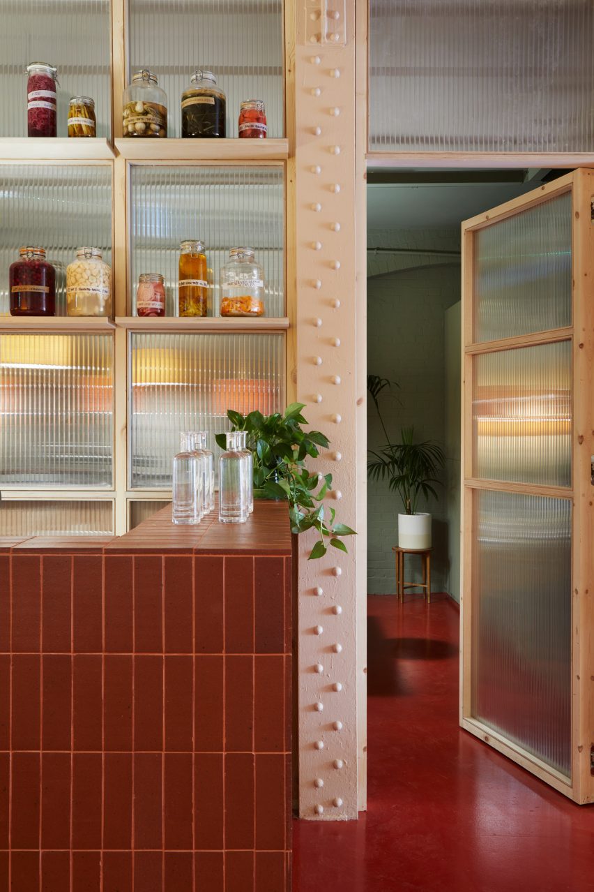Polycarbonate wall with wooden shelves