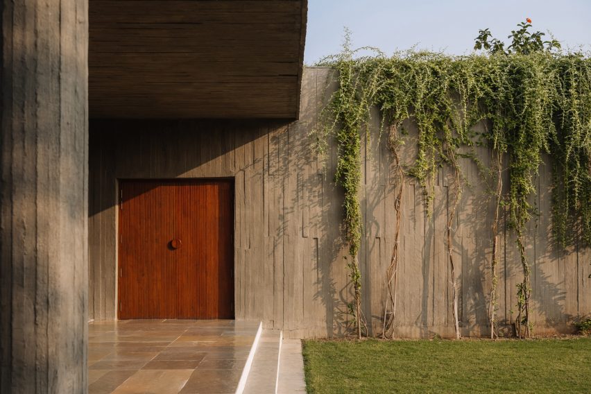 Outdoor porch with concrete walls and floors