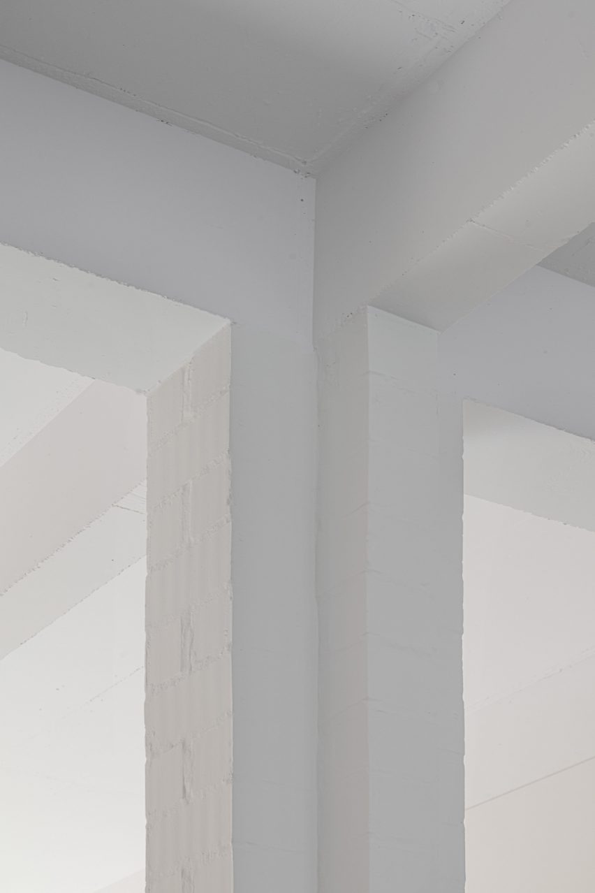 Detail photo of white-painted square columns