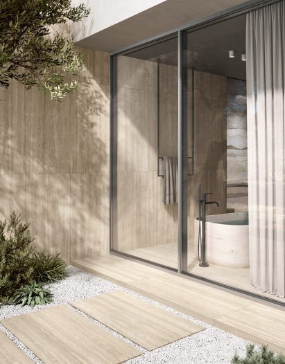 Photograph of sliding doors with neutral-coloured tiles