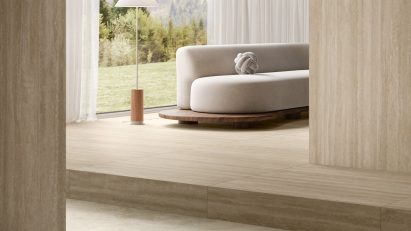 Photograph of interior with neutral-coloured tiles