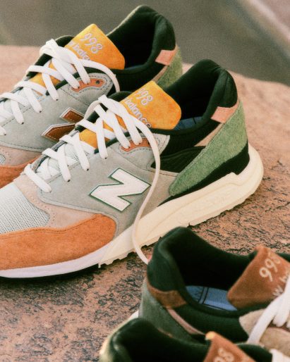 Frank Lloyd Wright Kith sneakers on a dusty stone surface