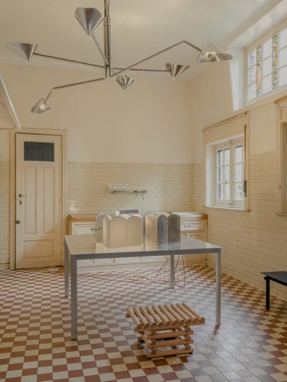 Kitchen at Hôtel Danckaert with table by Office KGDVS