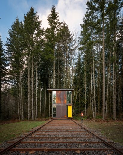 Yellow door on the steel studio