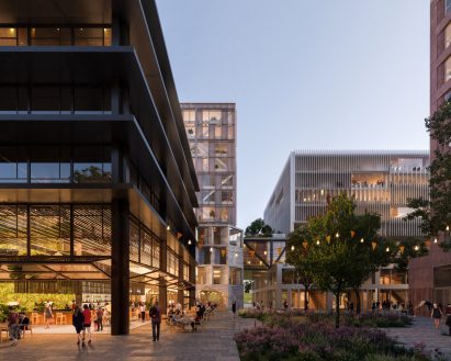 Render of a public square surrounded by tall cubic buildings at the Amstel Design District