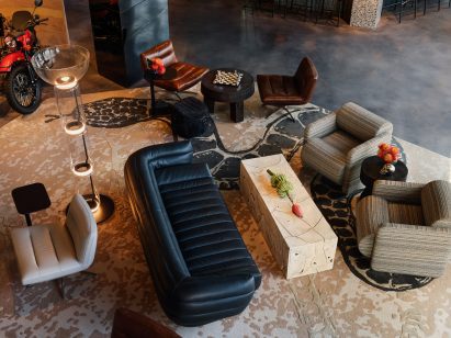 Moxy hotel lobby with motorcycle
