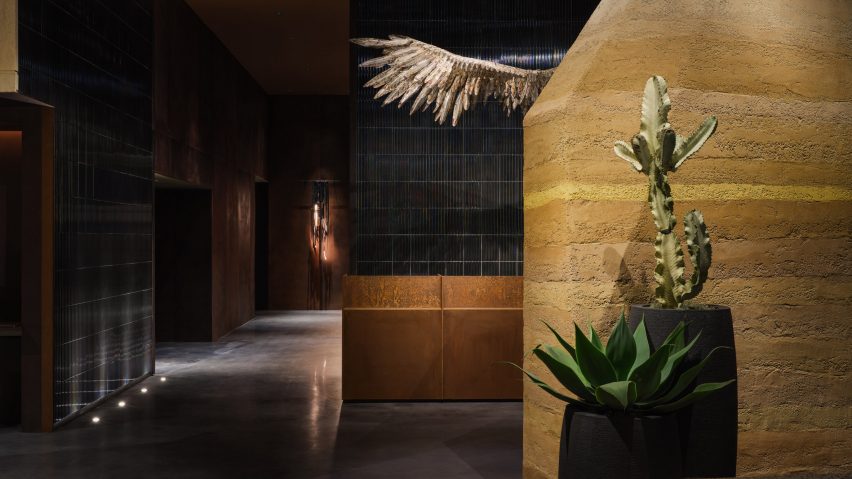 Moxy hotel rammed earth lobby walls
