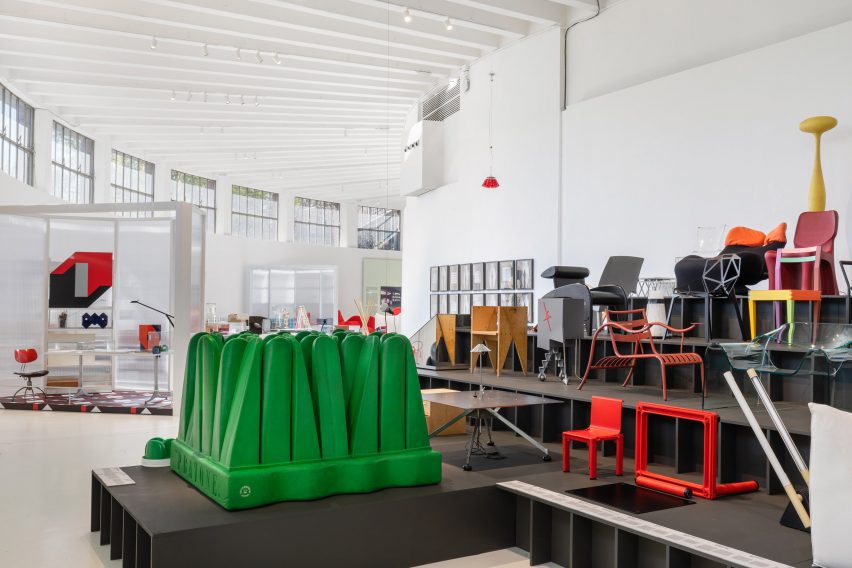 Photo of the Museo del Design Italiano showing furniture display in the foreground and a recreated interior installation in the background