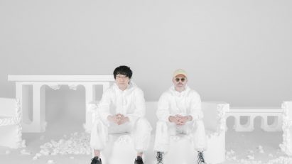 Nendo founder Oki Sato and Daniel Arsham sat on styrofoam piece at Make to Break exhibition Milan