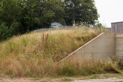 Earth berm at New Forest House
