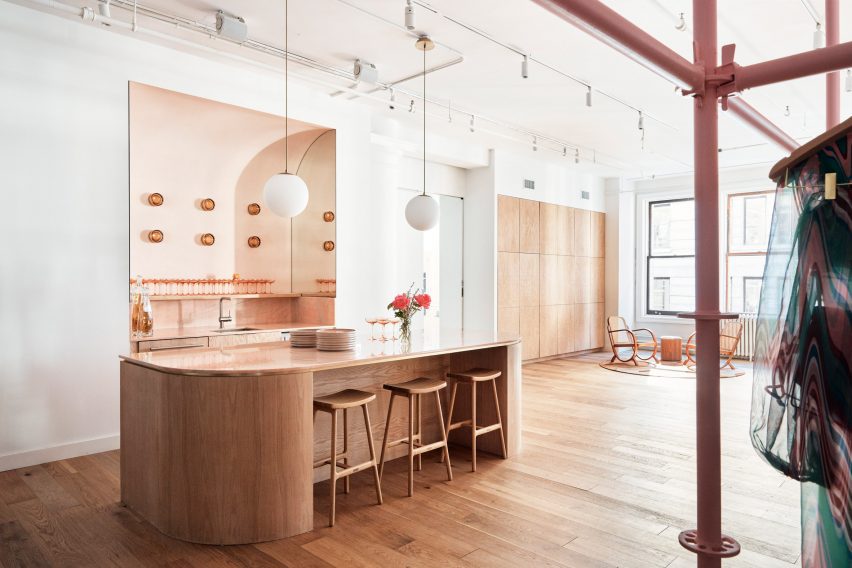 A bar area with pink stone counters