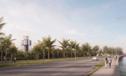 Air traffic control tower with palms and people walking