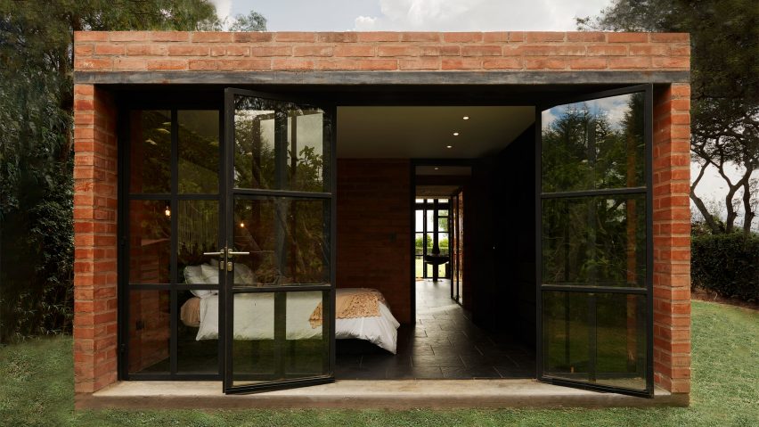 Exterior of a brick micro home with a window facade