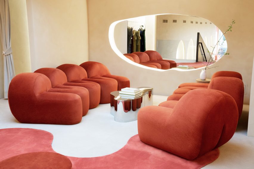 Red furniture in the fitting room area