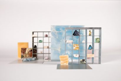 Slabs of different coloured stone on a white background depicting the Beyond The Surface exhibition by SolidNature